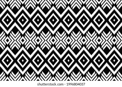 Ikat seamless pattern. Surface design for print, fabric, wallpaper, gift wrap, texture. Tribal vector illustration. Black and white background. Boho, ethnic style.