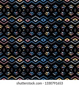 Ikat seamless pattern. Tribal art print. Chevron geometric background. Abstract zigzag pattern for cover design
