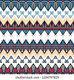 Ikat seamless pattern. Tribal art print. Chevron geometric background. Abstract zigzag pattern for cover design