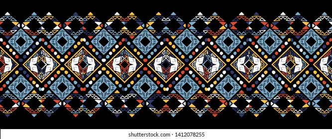 Ikat seamless pattern. Tribal art print. Chevron geometric background. Abstract zigzag pattern for cover design