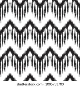 Ikat seamless pattern. Vector background. Black and white design for fashion textile prints, wallpapers, cards or wrapping papers.