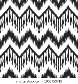 Ikat seamless pattern. Vector background. Black and white design for fashion textile prints, wallpapers, cards or wrapping papers.