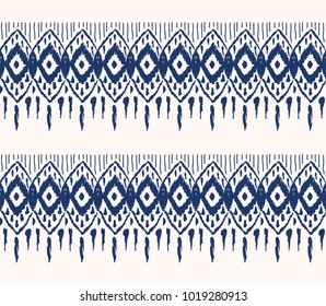 Ikat seamless pattern. Vector tie dye  shibori print with stripes and chevron. Ink textured japanese background.  Ethnic fabric vector. Bohemian fashion. Endless watercolor texture. African rug.