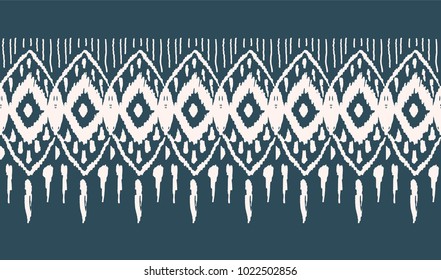Ikat seamless pattern. Vector tie dye  shibori print with stripes and chevron. Ink textured japanese background.  Ethnic fabric vector. Bohemian fashion. Endless watercolor texture. African rug.