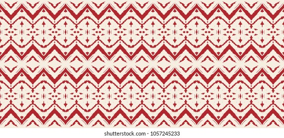 Ikat seamless pattern. Vector tie dye shibori print with stripes and chevron. Ink textured japanese background. Ethnic fabric vector. Bohemian fashion. Endless watercolor texture. African rug.