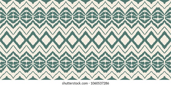 Ikat seamless pattern. Vector tie dye shibori print with stripes and chevron. Ink textured japanese background. Ethnic fabric vector. Bohemian fashion. Endless watercolor texture. African rug.