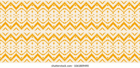 Ikat seamless pattern. Vector tie dye shibori print with stripes and chevron. Ink textured japanese background. Ethnic fabric vector. Bohemian fashion. Endless watercolor texture. African rug.