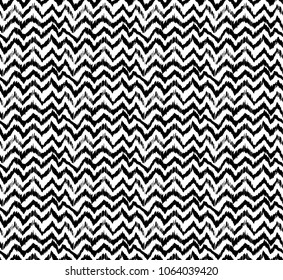 Ikat seamless pattern. Vector tie dye shibori print with stripes and chevron. Ink textured japanese background. Ethnic fabric vector. Bohemian fashion. Endless watercolor texture. African rug.
