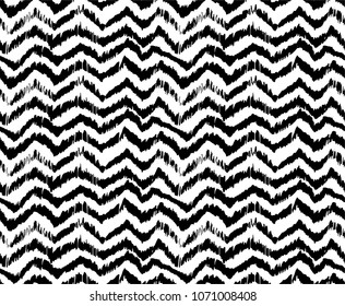 Ikat seamless pattern. Vector tie dye shibori print with stripes and chevron. Ink textured japanese background. Ethnic fabric vector. Bohemian fashion. Endless watercolor texture. African rug.