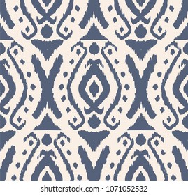 Ikat seamless pattern. Vector tie dye shibori print with stripes and chevron. Ink textured japanese background. Ethnic fabric vector. Bohemian fashion. Endless watercolor texture. African rug.