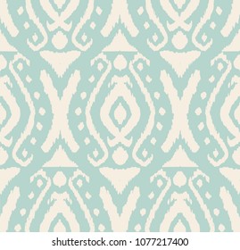 Ikat seamless pattern. Vector tie dye shibori print with stripes and chevron. Ink textured japanese background. Ethnic fabric vector. Bohemian fashion. Endless watercolor texture. African rug.