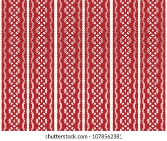 	
Ikat seamless pattern. Vector tie dye shibori print with stripes and chevron. 