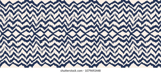 Ikat seamless pattern. Vector tie dye shibori print with stripes and chevron. Ink textured japanese background. Ethnic fabric vector. Bohemian fashion. Endless watercolor texture. African rug.