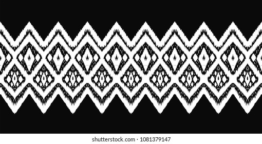 Ikat seamless pattern. Vector tie dye shibori print with stripes and chevron. Ink textured japanese background. Ethnic fabric vector. Bohemian fashion. Endless watercolor texture. African rug.