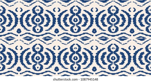 Ikat seamless pattern. Vector tie dye shibori print with stripes and chevron. Ink textured japanese background. Ethnic fabric vector. Bohemian fashion. Endless watercolor texture. African rug.