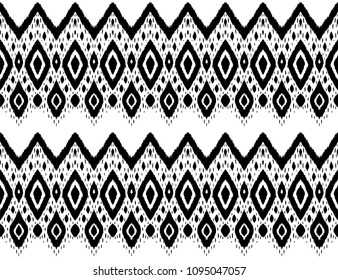 Ikat seamless pattern. Vector tie dye shibori print with stripes and chevron. Ink textured japanese background. Ethnic fabric vector. Bohemian fashion. Endless watercolor texture. African rug.