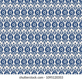 Ikat seamless pattern. Vector tie dye shibori print with stripes and chevron. Ink textured japanese background. Ethnic fabric vector. Bohemian fashion. Endless watercolor texture. African rug.
