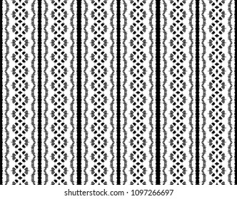 Ikat seamless pattern. Vector tie dye shibori print with stripes and chevron. Ink textured japanese background. Ethnic fabric vector. Bohemian fashion. Endless watercolor texture. African rug.