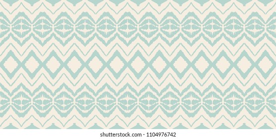 Ikat seamless pattern. Vector tie dye shibori print with stripes and chevron. Ink textured japanese background. Ethnic fabric vector. Bohemian fashion. Endless watercolor texture. African rug.