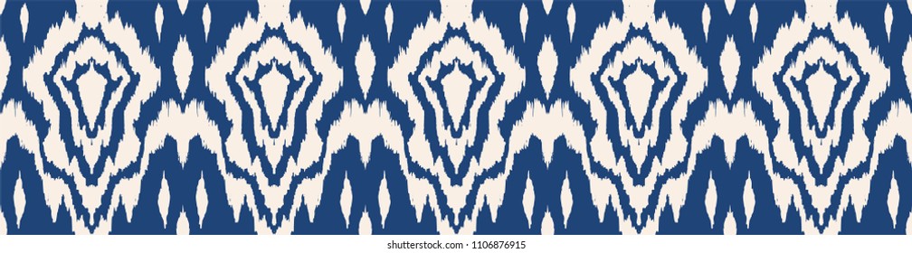Ikat seamless pattern. Vector tie dye shibori print with stripes and chevron. Ink textured japanese background. Ethnic fabric vector. Bohemian fashion. Endless watercolor texture. African rug.