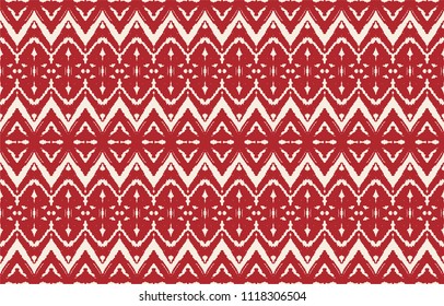 Ikat seamless pattern. Vector tie dye shibori print with stripes and chevron. Ink textured japanese background. Ethnic fabric vector. Bohemian fashion. Endless watercolor texture. African rug.