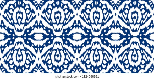 Ikat seamless pattern. Vector tie dye shibori print with stripes and chevron. Ink textured japanese background. Ethnic fabric vector. Bohemian fashion. Endless watercolor texture. African rug.