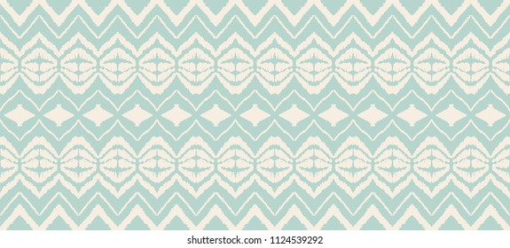 Ikat seamless pattern. Vector tie dye shibori print with stripes and chevron. Ink textured japanese background. Ethnic fabric vector. Bohemian fashion. Endless watercolor texture. African rug.