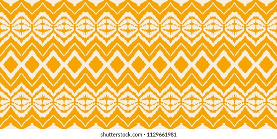 Ikat seamless pattern. Vector tie dye shibori print with stripes and chevron. Ink textured japanese background. Ethnic fabric vector. Bohemian fashion. Endless watercolor texture. African rug.