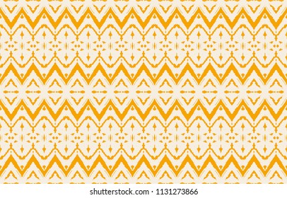 Ikat seamless pattern. Vector tie dye shibori print with stripes and chevron. Ink textured japanese background. Ethnic fabric vector. Bohemian fashion. Endless watercolor texture. African rug.