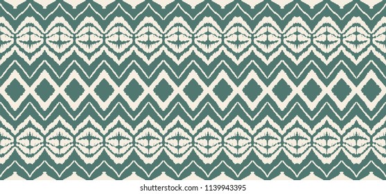 Ikat seamless pattern. Vector tie dye shibori print with stripes and chevron. Ink textured japanese background. Ethnic fabric vector. Bohemian fashion. Endless watercolor texture. African rug.