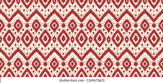 Ikat seamless pattern. Vector tie dye shibori print with stripes and chevron. Ink textured japanese background. Ethnic fabric vector. Bohemian fashion. Endless watercolor texture. African rug.