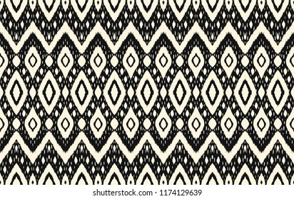 Ikat seamless pattern. Vector tie dye shibori print with stripes and chevron. Ink textured japanese background. Ethnic fabric vector. Bohemian fashion. Endless watercolor texture. African rug.