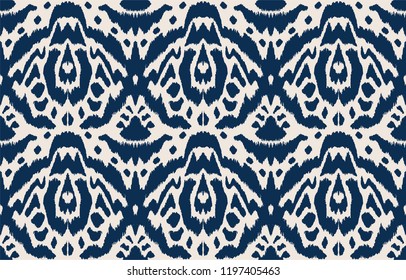 Ikat seamless pattern. Vector tie dye shibori print with stripes and chevron. Ink textured japanese background. Ethnic fabric vector. Bohemian fashion. Endless watercolor texture. African rug.