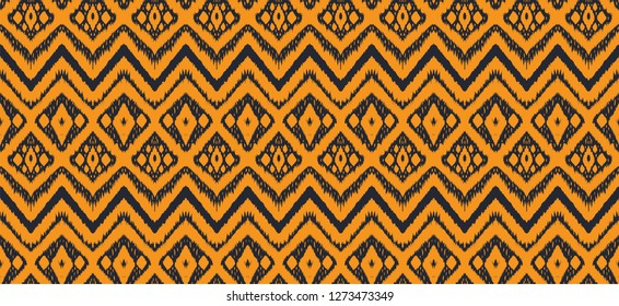 Ikat seamless pattern. Vector tie dye shibori print with stripes and chevron. Ink textured japanese background. Ethnic fabric vector. Bohemian fashion. Endless watercolor texture. African rug.