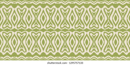Ikat seamless pattern. Vector tie dye shibori print with stripes and chevron. Ink textured japanese background. Ethnic fabric vector. Bohemian fashion. Endless watercolor texture. African rug.