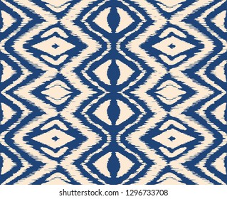 Ikat seamless pattern. Vector tie dye shibori print with stripes and chevron. Ink textured japanese background. Ethnic fabric vector. Bohemian fashion. Endless watercolor texture. African rug.
