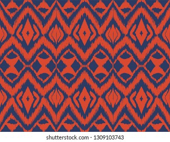 Ikat seamless pattern. Vector tie dye shibori print with stripes and chevron. Ink textured japanese background. Ethnic fabric vector. Bohemian fashion. Endless watercolor texture. African rug.