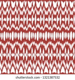 Ikat seamless pattern. Vector tie dye shibori print with stripes and chevron. Ink textured japanese background. Ethnic fabric vector. Bohemian fashion. Endless watercolor texture. African rug.