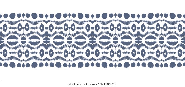 Ikat seamless pattern. Vector tie dye shibori print with stripes and chevron. Ink textured japanese background. Ethnic fabric vector. Bohemian fashion. Endless watercolor texture. African rug.