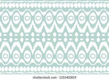 Ikat seamless pattern. Vector tie dye shibori print with stripes and chevron. Ink textured japanese background. Ethnic fabric vector. Bohemian fashion. Endless watercolor texture. African rug.