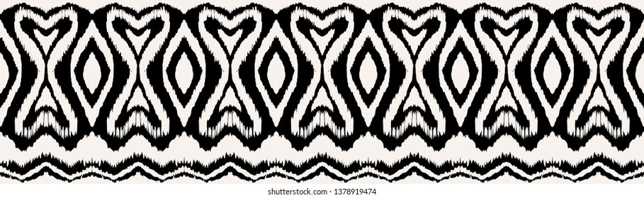 Ikat seamless pattern. Vector tie dye shibori print with stripes and chevron. Ink textured japanese background. Ethnic fabric vector. Bohemian fashion. Endless watercolor texture. African rug.