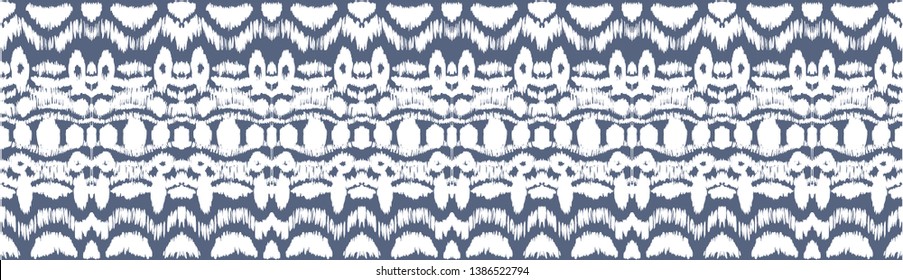 Ikat seamless pattern. Vector tie dye shibori print with stripes and chevron. Ink textured japanese background. Ethnic fabric vector. Bohemian fashion. Endless watercolor texture. African rug.