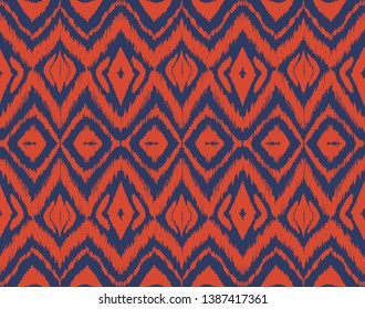 Ikat seamless pattern. Vector tie dye shibori print with stripes and chevron. Ink textured japanese background. Ethnic fabric vector. Bohemian fashion. Endless watercolor texture. African rug.
