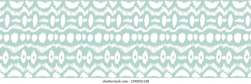 Ikat seamless pattern. Vector tie dye shibori print with stripes and chevron. Ink textured japanese background. Ethnic fabric vector. Bohemian fashion. Endless watercolor texture. African rug.