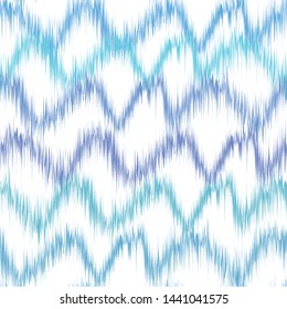 Ikat seamless pattern with waves. Abstract background texture.
