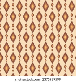 Ikat seamless pattern.Ethnic geometric silk texture background.Repeat diamond shape pattern isolated on beige background.