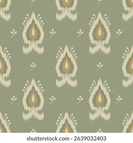 Ikat textile pattern in sage green and cream tones. Ethnic boho fabric, seamless design, decorative vintage tribal ornament for print and home decor.
