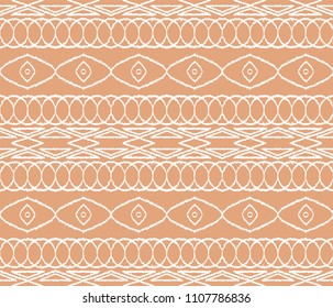 Ikat tribal art print. Seamless African pattern. Ethnic ornament on the carpet. Aztec style. Figure tribal embroidery. Indian, Mexican, folk pattern. African rug.