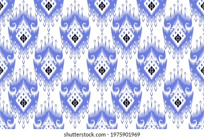 Ikat tribal Indian seamless pattern design. Aztec fabric carpet mandala ornament native boho chevron textile decoration. Geometric African American vector illustrations background.