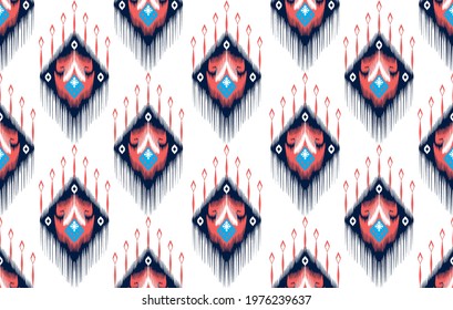 Ikat tribal Indian seamless pattern design. Aztec fabric carpet mandala ornament native boho chevron textile decoration. Geometric African American vector illustrations background.